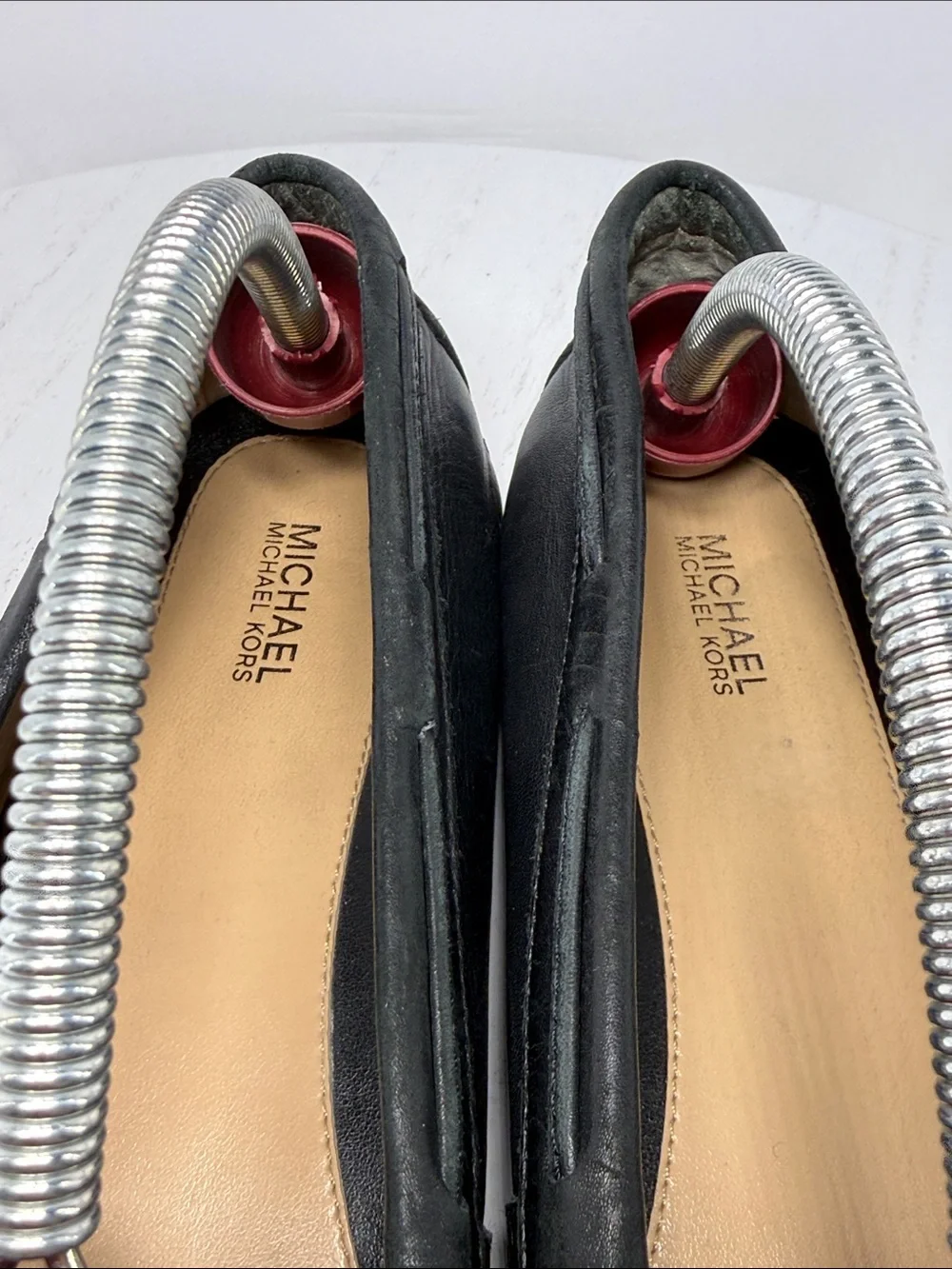 Michael Kors Metallic Silver and Black Leather Flats